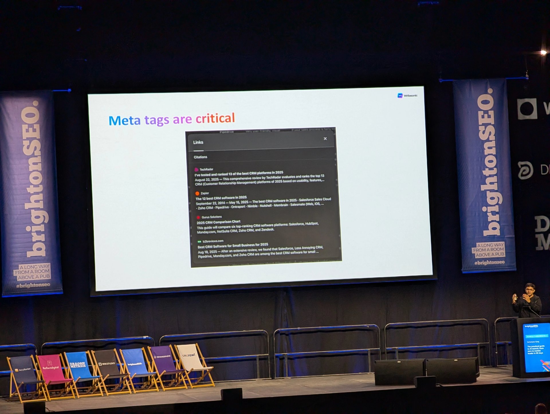 Samanyou Garg, Writesonic Founder and CEO, presenting at BrightonSEO. SOZO and the Writesonic team met at the event, which was the starting point for the partnership.